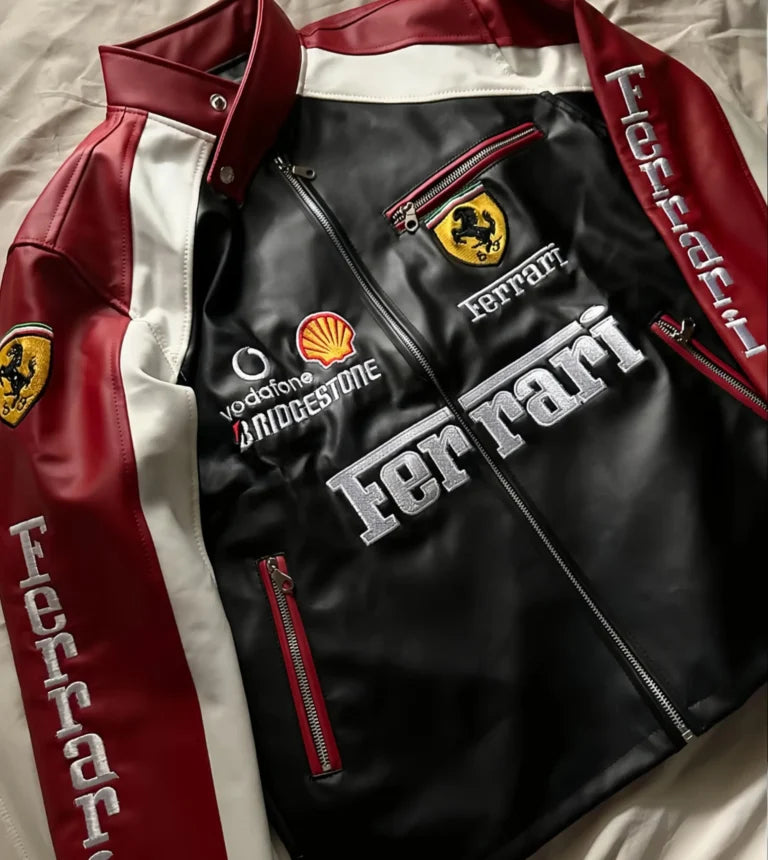 Ferrari leather jacket with branding and logos on a neutral background